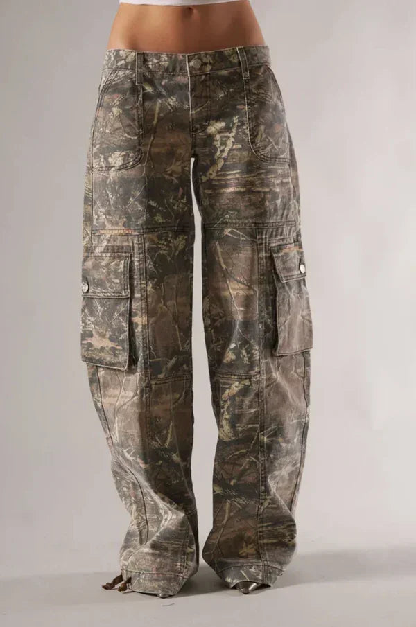 Camouflage cargo pants on a plain background